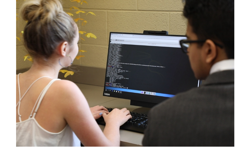 High schools students working on a computer
