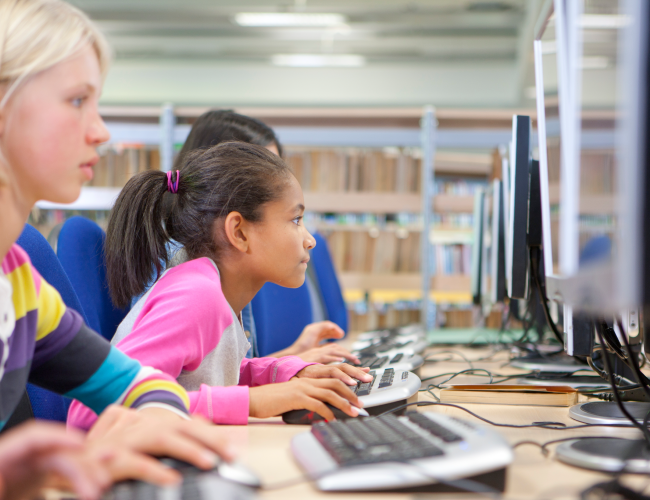 Cybersecurity students in computer class