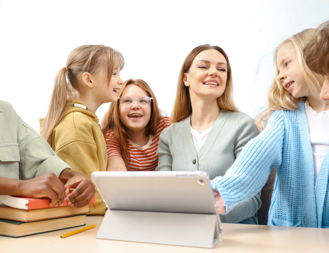Students gathered around their teacher